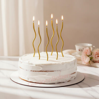 Wholesome Delight Cake topped with golden candles