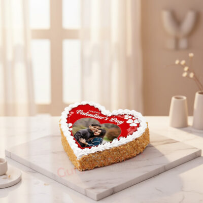 Heart-shaped Valentine's Day cake with a photo