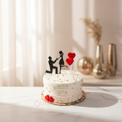 A beautifully crafted Valentine's cake featuring a romantic couple figurine.