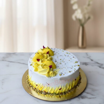 Beautifully decorated customized rasmalai cake with saffron and pistachio