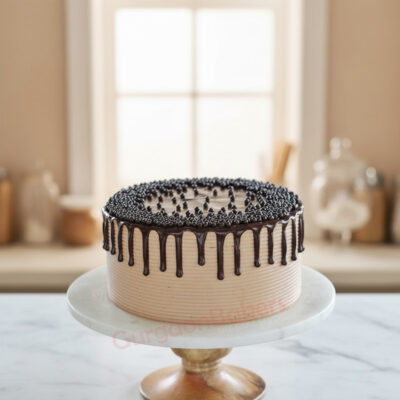 Decadent Healthy Chocolate Cake with chocolate drizzle and sprinkles