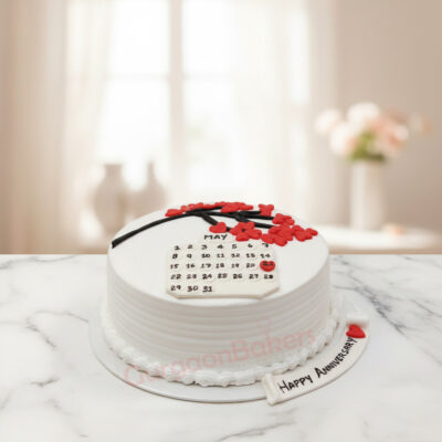 A beautifully designed Anniversary Calendar Cake featuring a calendar and blooming flowers in Gurgaon | Gurgaon Bakers