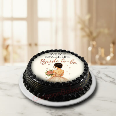 A beautifully decorated Bride to Be cake with a bride illustration and floral design.