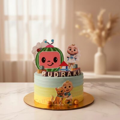 Colorful Cocomelon birthday cake with character toppers in Gurgaon | Gurgaon Bakers