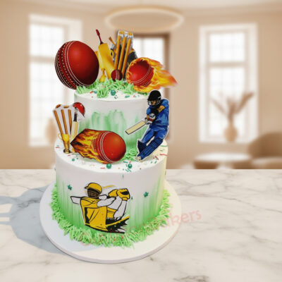 Cricket-themed two-tier cake with cricket players and balls in Gurgaon | Gurgaon Bakers