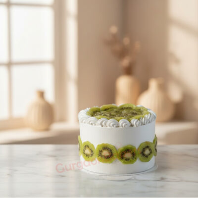 A beautifully crafted custom kiwi cake topped with fresh kiwi slices and whipped cream.