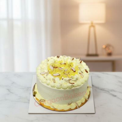 Custom Rasmalai Cake topped with almonds and saffron