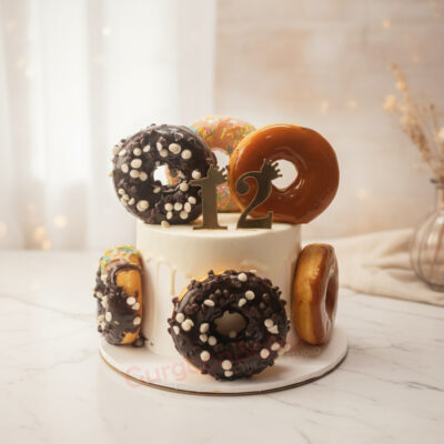 Delicious doughnut cake design featuring colorful doughnuts and a birthday number on top in Gurgaon | Gurgaon Bakers