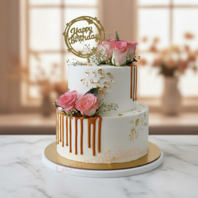 Elegant pink tier birthday cake with roses and gold accents in Gurgaon | Gurgaon Bakers