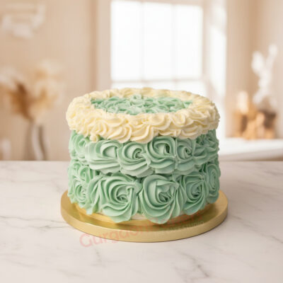 Minty Blossom Smash Cake with beautiful mint and cream frosting.