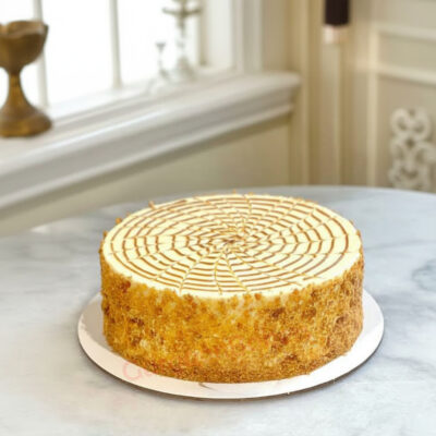 Nutty chocolate cake with a delicate patterned top