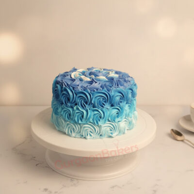 Beautiful Ocean Wave Smash Cake in blue and white frosting.