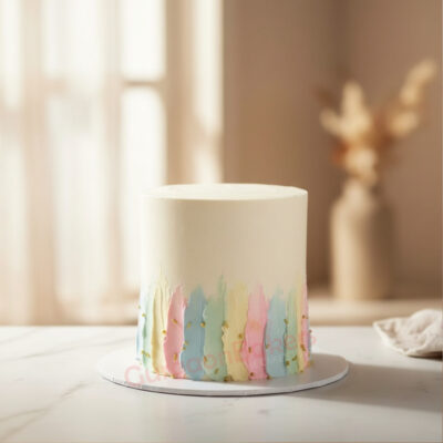 A stunning pastel cake with decorative swirls