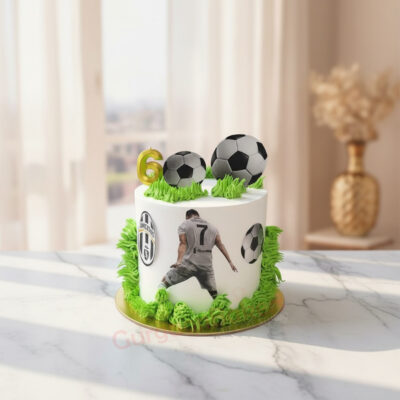 Ranaldo football cake design with green grass icing and football toppers in Gurgaon | Gurgaon Bakers