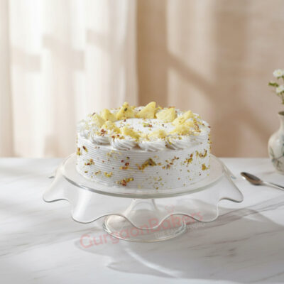 Delicious Rasmalai Cake from Gurgaon Bakers topped with pistachios