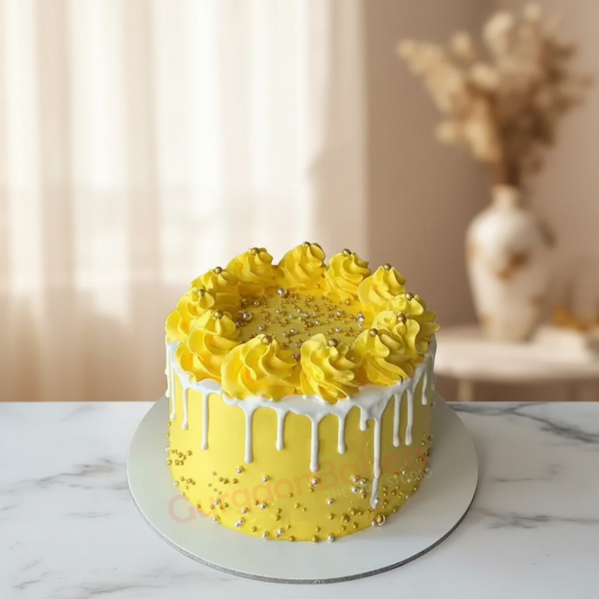 Delightful Birthday Mango Cake Delicious birthday mango cake with yellow frosting and decorations in Gurgaon | Gurgaon Bakers