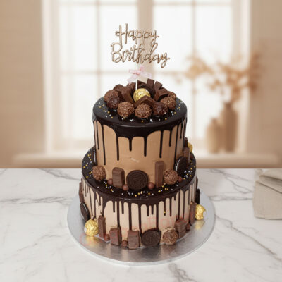 A beautifully decorated Ferrero Rocher birthday cake with chocolate frosting and chocolate decor in Gurgaon | Gurgaon Ba