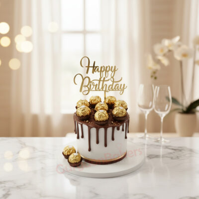 A luxurious Ferrero Rocher birthday cake topped with golden hazelnuts and a 'Happy Birthday' sign in Gurgaon | Gurgaon B