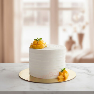 Mango and cream cake with fresh mango toppings in Gurgaon | Gurgaon Bakers