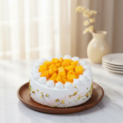 Delicious mango cream cake topped with fresh mango cubes in Gurgaon | Gurgaon Bakers