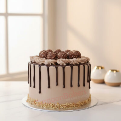 A delicious Ferrero Rocher cake topped with chocolate ganache and Ferrero Rocher chocolates in Gurgaon | Gurgaon Bakers