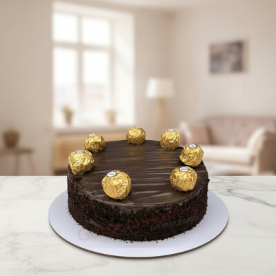 A luxurious Chocolate Ferrero Rocher Cake topped with golden Ferrero chocolates in Gurgaon | Gurgaon Bakers