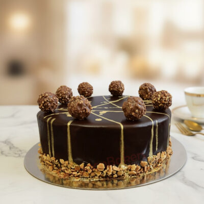 Gorgeous Ferrero Rocher Cake decorated with chocolate and hazelnuts in Gurgaon | Gurgaon Bakers