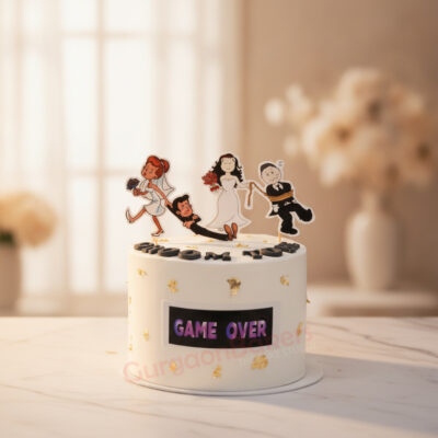 Whimsical Game Over cake with playful toppers in Gurgaon | Gurgaon Bakers