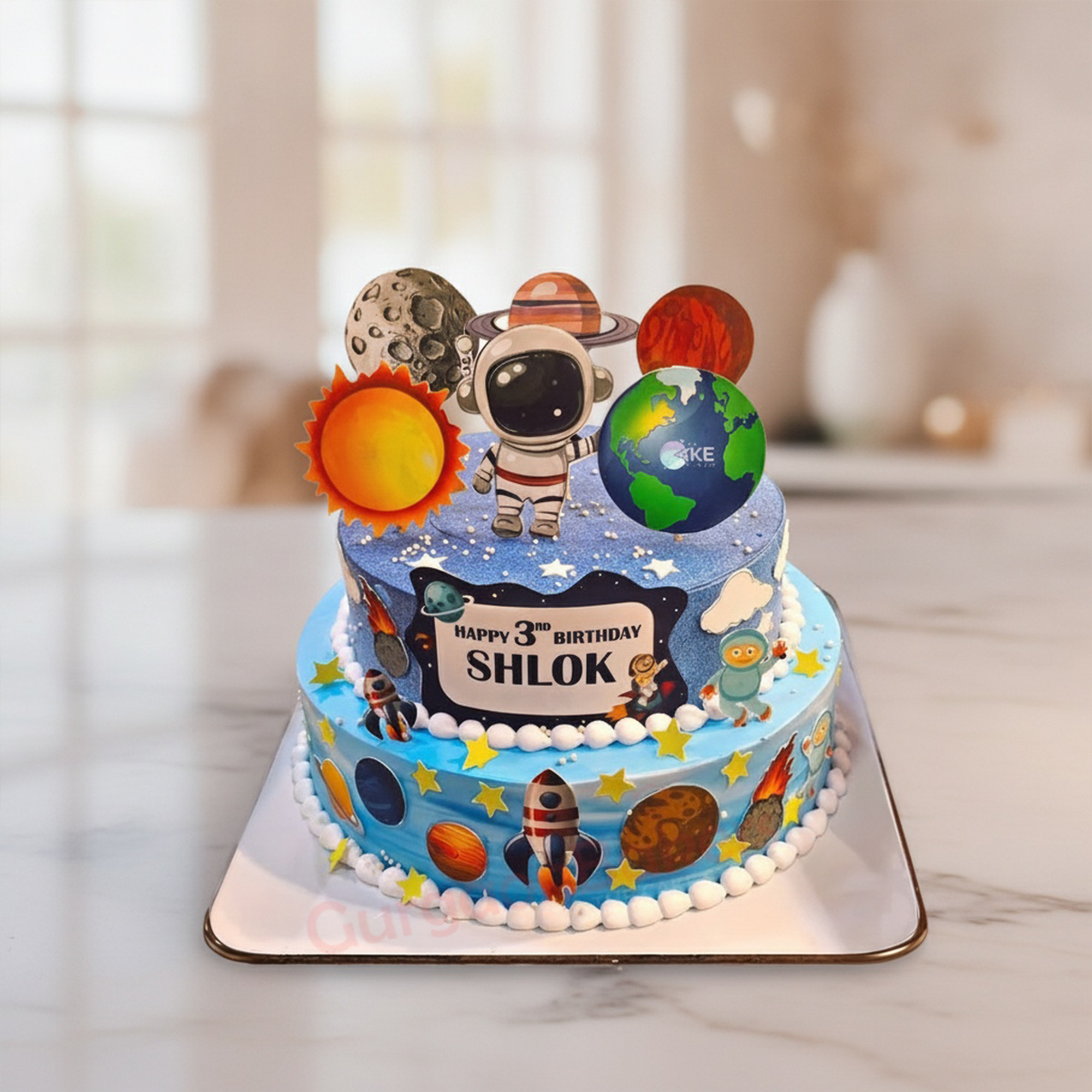 Astronaut Adventure Cake A beautifully crafted astronaut cake for kids featuring planets and an astronaut decor in Gurgaon | Gurgaon Bakers