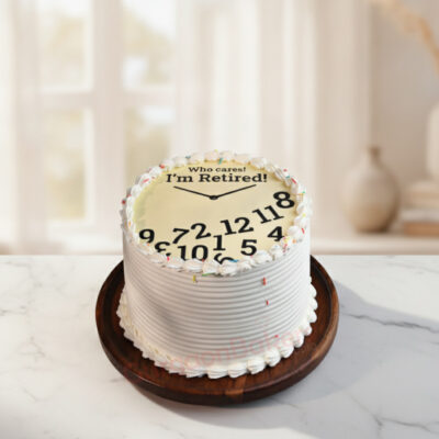 Custom retirement cake with clock design saying 'I'm Retired!' in Gurgaon | Gurgaon Bakers