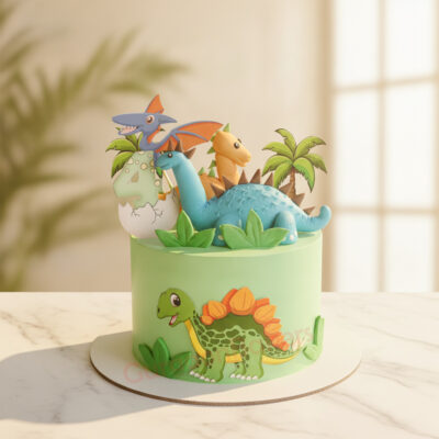 Colorful dinosaur birthday cake for a 2-year-old with playful dinosaur figurines and green leaves in Gurgaon | Gurgaon B
