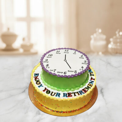 A colorful funny retirement cake designed with a clock and cheerful message in Gurgaon | Gurgaon Bakers
