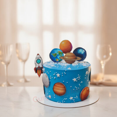 A vibrant Outer Space Cake featuring planets and a rocket in Gurgaon | Gurgaon Bakers
