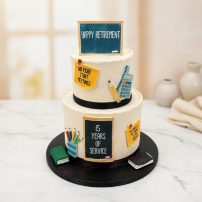 Two-tiered retirement party cake with chalkboard decorations in Gurgaon | Gurgaon Bakers